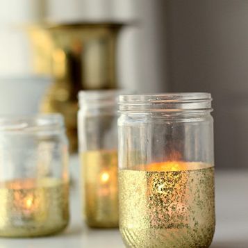 http://www.madiganmade.com/2013/08/glitter-and-gold-dipped-jar-candles.html